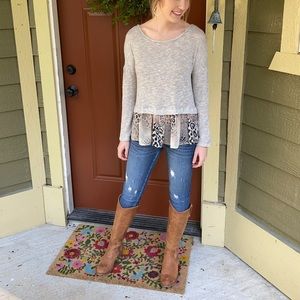 Sweater with leopard and snakeskin ruffle bottom